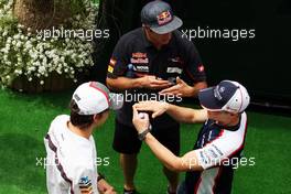 (L to R): Esteban Gutierrez (MEX) Sauber with Daniel Ricciardo (AUS) Scuderia Toro Rosso and Valtteri Bottas (FIN) Williams. 09.05.2013. Formula 1 World Championship, Rd 5, Spanish Grand Prix, Barcelona, Spain, Preparation Day