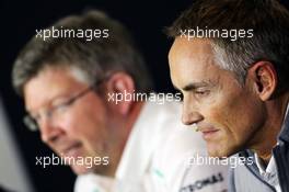 Martin Whitmarsh (GBR) McLaren Chief Executive Officer and Ross Brawn (GBR) Mercedes AMG F1 Team Principal in the FIA Press Conference. 28.06.2013. Formula 1 World Championship, Rd 8, British Grand Prix, Silverstone, England, Practice Day.