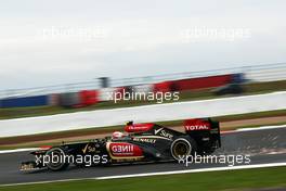 Sparks flying from Romain Grosjean (FRA) Lotus F1 E21. 28.06.2013. Formula 1 World Championship, Rd 8, British Grand Prix, Silverstone, England, Practice Day.