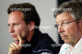 (L to R): Christian Horner (GBR) Red Bull Racing Team Principal and Ross Brawn (GBR) Mercedes AMG F1 Team Principal in the FIA Press Conference. 28.06.2013. Formula 1 World Championship, Rd 8, British Grand Prix, Silverstone, England, Practice Day.