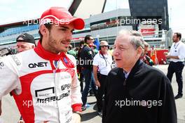 Jules Bianchi (FRA) Marussia F1 Team with Jean Todt (FRA) FIA President on the grid. 30.06.2013. Formula 1 World Championship, Rd 8, British Grand Prix, Silverstone, England, Race Day.