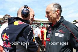 (L to R): Adrian Newey (GBR) Red Bull Racing Chief Technical Officer with Franz Tost (AUT) Scuderia Toro Rosso Team Principal on the grid. 30.06.2013. Formula 1 World Championship, Rd 8, British Grand Prix, Silverstone, England, Race Day.
