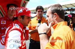 Rubens Barrichello (BRA) with Felipe Massa (BRA) Ferrari on the grid. 30.06.2013. Formula 1 World Championship, Rd 8, British Grand Prix, Silverstone, England, Race Day.