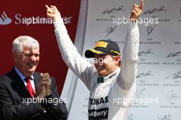Race winner Nico Rosberg (GER) Mercedes AMG F1 celebrates on the podium. 30.06.2013. Formula 1 World Championship, Rd 8, British Grand Prix, Silverstone, England, Race Day.