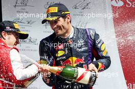 Mark Webber (AUS) Red Bull Racing celebrates his second position on the podium. 30.06.2013. Formula 1 World Championship, Rd 8, British Grand Prix, Silverstone, England, Race Day.