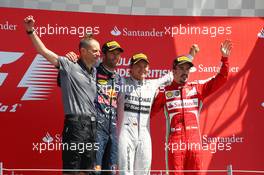 The podium (L to R): Mark Webber (AUS) Red Bull Racing, second; Nico Rosberg (GER) Mercedes AMG F1, race winner; Fernando Alonso (ESP) Ferrari, third. 30.06.2013. Formula 1 World Championship, Rd 8, British Grand Prix, Silverstone, England, Race Day.