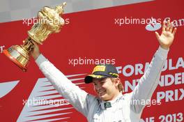 Race winner Nico Rosberg (GER) Mercedes AMG F1 celebrates on the podium. 30.06.2013. Formula 1 World Championship, Rd 8, British Grand Prix, Silverstone, England, Race Day.