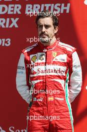Fernando Alonso (ESP) Ferrari on the podium. 30.06.2013. Formula 1 World Championship, Rd 8, British Grand Prix, Silverstone, England, Race Day.