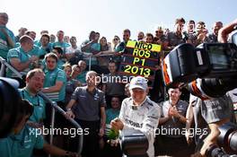 Race winner Nico Rosberg (GER) Mercedes AMG F1 celebrates with the team. 30.06.2013. Formula 1 World Championship, Rd 8, British Grand Prix, Silverstone, England, Race Day.