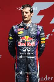 Mark Webber (AUS) Red Bull Racing on the podium. 30.06.2013. Formula 1 World Championship, Rd 8, British Grand Prix, Silverstone, England, Race Day.