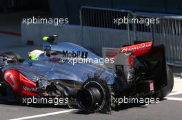 Sergio Perez (MEX) McLaren MP4-28 with a tyre blow out failure. 30.06.2013. Formula 1 World Championship, Rd 8, British Grand Prix, Silverstone, England, Race Day.