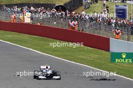 Valtteri Bottas (FIN) Williams FW35 passes tyre debris. 30.06.2013. Formula 1 World Championship, Rd 8, British Grand Prix, Silverstone, England, Race Day.