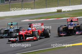 Fernando Alonso (ESP), Scuderia Ferrari and Daniel Ricciardo (AUS), Scuderia Toro Rosso  30.06.2013. Formula 1 World Championship, Rd 8, British Grand Prix, Silverstone, England, Race Day.