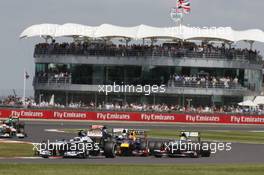 Valtteri Bottas (FIN) Williams FW35 leads Mark Webber (AUS) Red Bull Racing RB9 and Esteban Gutierrez (MEX) Sauber C32. 30.06.2013. Formula 1 World Championship, Rd 8, British Grand Prix, Silverstone, England, Race Day.