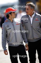 (L to R): Sergio Perez (MEX) McLaren and Martin Whitmarsh (GBR) McLaren Chief Executive Officer. 29.06.2013. Formula 1 World Championship, Rd 8, British Grand Prix, Silverstone, England, Qualifying Day.