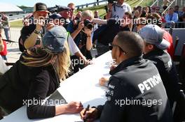 Lewis Hamilton (GBR) Mercedes AMG F1 signs autographs for the fans. 29.06.2013. Formula 1 World Championship, Rd 8, British Grand Prix, Silverstone, England, Qualifying Day.