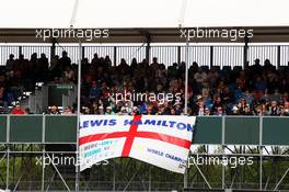 Fans and a banner for Lewis Hamilton (GBR) Mercedes AMG F1. 29.06.2013. Formula 1 World Championship, Rd 8, British Grand Prix, Silverstone, England, Qualifying Day.