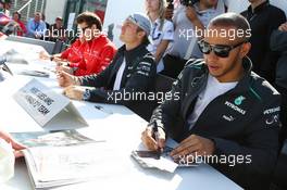 Lewis Hamilton (GBR) Mercedes AMG F1 signs autographs for the fans. 29.06.2013. Formula 1 World Championship, Rd 8, British Grand Prix, Silverstone, England, Qualifying Day.