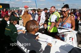 Lewis Hamilton (GBR) Mercedes AMG F1 signs autographs for the fans. 29.06.2013. Formula 1 World Championship, Rd 8, British Grand Prix, Silverstone, England, Qualifying Day.