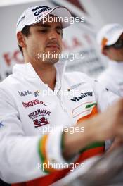Adrian Sutil (GER) Sahara Force India F1 signs autographs for the fans. 29.06.2013. Formula 1 World Championship, Rd 8, British Grand Prix, Silverstone, England, Qualifying Day.