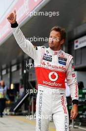 Jenson Button (GBR) McLaren waves to the fans. 29.06.2013. Formula 1 World Championship, Rd 8, British Grand Prix, Silverstone, England, Qualifying Day.