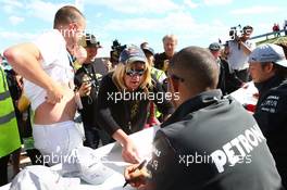 Lewis Hamilton (GBR) Mercedes AMG F1 signs autographs for the fans. 29.06.2013. Formula 1 World Championship, Rd 8, British Grand Prix, Silverstone, England, Qualifying Day.