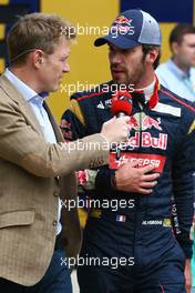 Jean-Eric Vergne (FRA) Scuderia Toro Rosso with Simon Lazenby (GBR) Sky Sports F1 TV Presenter. 29.06.2013. Formula 1 World Championship, Rd 8, British Grand Prix, Silverstone, England, Qualifying Day.