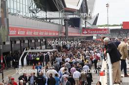 Fans in the pit lane. 29.06.2013. Formula 1 World Championship, Rd 8, British Grand Prix, Silverstone, England, Qualifying Day.