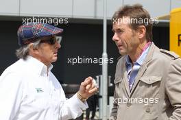 (L to R): Jackie Stewart (GBR) with Paul Stewart (GBR). 29.06.2013. Formula 1 World Championship, Rd 8, British Grand Prix, Silverstone, England, Qualifying Day.