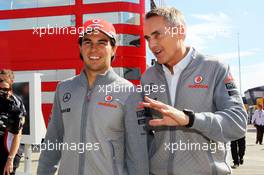 (L to R): Sergio Perez (MEX) McLaren with Martin Whitmarsh (GBR) McLaren Chief Executive Officer. 29.06.2013. Formula 1 World Championship, Rd 8, British Grand Prix, Silverstone, England, Qualifying Day.