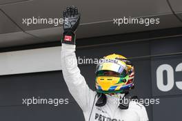 Lewis Hamilton (GBR) Mercedes AMG F1 celebrates his pole position in parc ferme. 29.06.2013. Formula 1 World Championship, Rd 8, British Grand Prix, Silverstone, England, Qualifying Day.