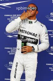 Lewis Hamilton (GBR) Mercedes AMG F1 celebrates his pole position in parc ferme. 29.06.2013. Formula 1 World Championship, Rd 8, British Grand Prix, Silverstone, England, Qualifying Day.