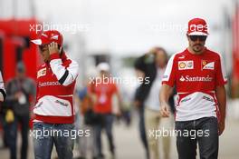 (L to R): Felipe Massa (BRA) Ferrari with Fernando Alonso (ESP) Ferrari. 29.06.2013. Formula 1 World Championship, Rd 8, British Grand Prix, Silverstone, England, Qualifying Day.