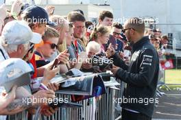 Lewis Hamilton (GBR) Mercedes AMG F1 signs autographs for the fans at the post race concert. 30.06.2013. Formula 1 World Championship, Rd 8, British Grand Prix, Silverstone, England, Race Day.
