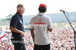 (L to R): Tony Jardine (GBR) and Sergio Perez (MEX) McLaren at the post race concert. 30.06.2013. Formula 1 World Championship, Rd 8, British Grand Prix, Silverstone, England, Race Day.