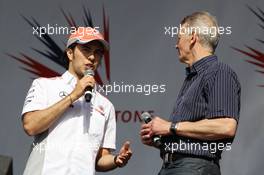 (L to R): Sergio Perez (MEX) McLaren and Tony Jardine (GBR) at the post race concert. 30.06.2013. Formula 1 World Championship, Rd 8, British Grand Prix, Silverstone, England, Race Day.