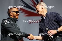 (L to R): Lewis Hamilton (GBR) Mercedes AMG F1 and Tony Jardine (GBR) at the post race concert. 30.06.2013. Formula 1 World Championship, Rd 8, British Grand Prix, Silverstone, England, Race Day.