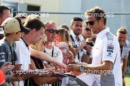 Jenson Button (GBR) McLaren signs autographs for the fans at the post race concert. 30.06.2013. Formula 1 World Championship, Rd 8, British Grand Prix, Silverstone, England, Race Day.