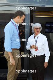 (L to R): Scott Piecha (GBR) Journalist with  Bernie Ecclestone (GBR) CEO Formula One Group (FOM). 30.06.2013. Formula 1 World Championship, Rd 8, British Grand Prix, Silverstone, England, Race Day.