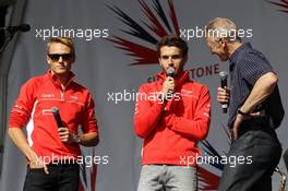 (L to R): Max Chilton (GBR) Marussia F1 Team, Jules Bianchi (FRA) Marussia F1 Team and Tony Jardine (GBR) at the post race concert. 30.06.2013. Formula 1 World Championship, Rd 8, British Grand Prix, Silverstone, England, Race Day.