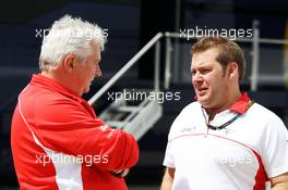(L to R): Pat Symonds (GBR) Marussia F1 Team Technical Consultant with Dave Greenwood (GBR) Marussia F1 Team Race Engineer. 30.06.2013. Formula 1 World Championship, Rd 8, British Grand Prix, Silverstone, England, Race Day.