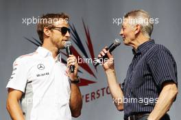 (L to R): Jenson Button (GBR) McLaren and Tony Jardine (GBR) at the post race concert. 30.06.2013. Formula 1 World Championship, Rd 8, British Grand Prix, Silverstone, England, Race Day.