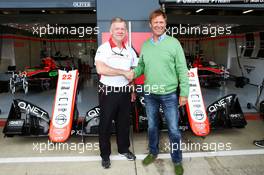 (L to R): Andy Webb (GBR) Marussia F1 Team CEO with Nigel Howe (GBR) Reading FC Chief Executive, announce a partnership between the Marussia F1 Team and Reading Football Club.  30.06.2013. Formula 1 World Championship, Rd 8, British Grand Prix, Silverstone, England, Race Day.