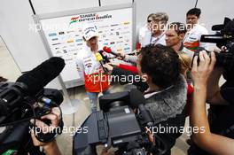 Adrian Sutil (GER) Sahara Force India F1 with the media. 27.06.2013. Formula 1 World Championship, Rd 8, British Grand Prix, Silverstone, England, Preparation Day.