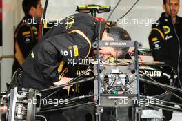 Lotus F1 E21 of Romain Grosjean (FRA) Lotus F1 Team is prepared in the pits. 27.06.2013. Formula 1 World Championship, Rd 8, British Grand Prix, Silverstone, England, Preparation Day.
