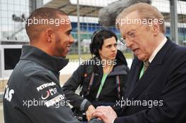 Lewis Hamilton (GBR) Mercedes AMG F1 with Sir David Frost (GBR) Broadcaster. 27.06.2013. Formula 1 World Championship, Rd 8, British Grand Prix, Silverstone, England, Preparation Day.