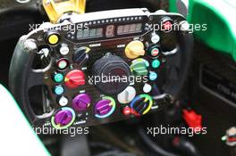 Caterham CT03 steering wheel. 27.06.2013. Formula 1 World Championship, Rd 8, British Grand Prix, Silverstone, England, Preparation Day.