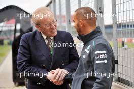 Lewis Hamilton (GBR) Mercedes AMG F1 with Sir David Frost (GBR) Broadcaster. 27.06.2013. Formula 1 World Championship, Rd 8, British Grand Prix, Silverstone, England, Preparation Day.
