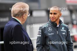 Lewis Hamilton (GBR) Mercedes AMG F1 with Sir David Frost (GBR) Broadcaster. 27.06.2013. Formula 1 World Championship, Rd 8, British Grand Prix, Silverstone, England, Preparation Day.