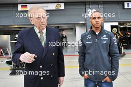 Lewis Hamilton (GBR) Mercedes AMG F1 with Sir David Frost (GBR) Broadcaster. 27.06.2013. Formula 1 World Championship, Rd 8, British Grand Prix, Silverstone, England, Preparation Day.